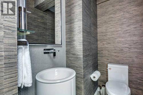 DISCREET 2 PIECE POWDER ROOM - 530 Crescent Road Nw, Calgary, AB - Indoor Photo Showing Bathroom