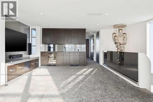 WET BAR WITH SUBZERO WINE FRIDGE AND SUBZERO BAR FRIDGE - 530 Crescent Road Nw, Calgary, AB - Indoor Photo Showing Other Room