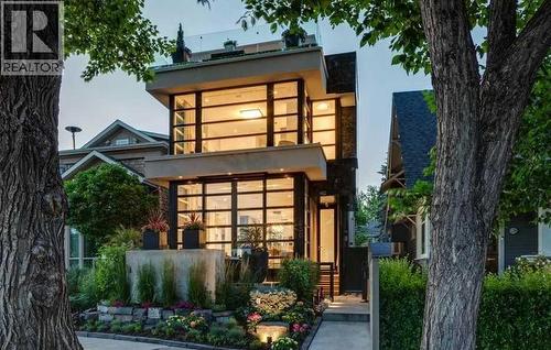 GORGEOUS PROFESSIONAL LOW MAINTENANCE LANDSCAPING...ALL PERENNIALS. LIGHTING.  ELECTROMAGNETIC LOCKING FRONT GATE FOR SECURITY - 530 Crescent Road Nw, Calgary, AB - Outdoor