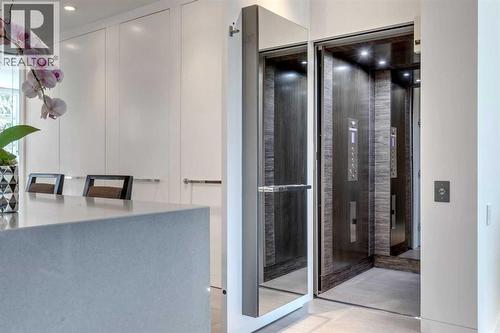 ELEVATOR CONNECTS ALL LEVELS OF THE HOME - 530 Crescent Road Nw, Calgary, AB - Indoor Photo Showing Other Room