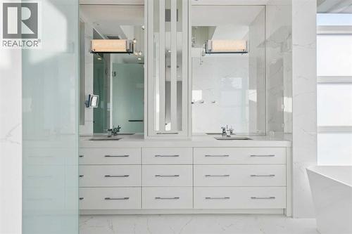 SPA-LIKE ENSUITE WITH DOUBLE VANITY THAT INCLUDES STORAGE TOWER - 530 Crescent Road Nw, Calgary, AB - Indoor Photo Showing Bathroom