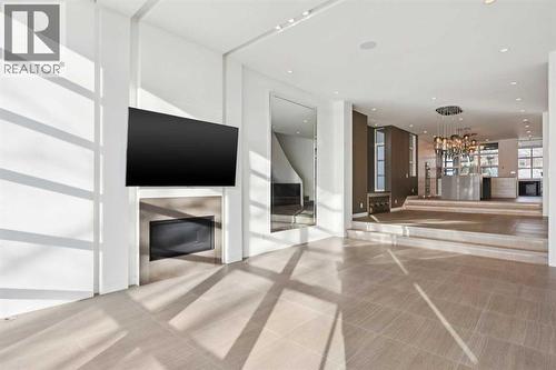 OPEN PLAN FRONT TO BACK - 530 Crescent Road Nw, Calgary, AB - Indoor Photo Showing Other Room With Fireplace