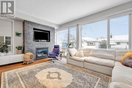 32 Sims Avenue, Ottawa, ON - Indoor Photo Showing Living Room With Fireplace