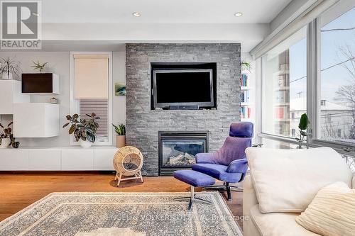 32 Sims Avenue, Ottawa, ON - Indoor Photo Showing Living Room With Fireplace