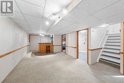 Lower level with family room and b/i bar - 