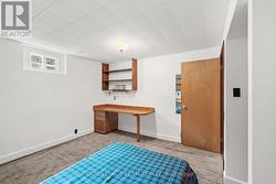 Lower Level 4th Bedroom with custom built ins - 