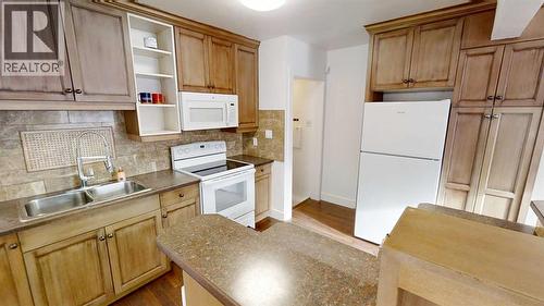 1505 8 Avenue S, Lethbridge, AB - Indoor Photo Showing Kitchen With Double Sink
