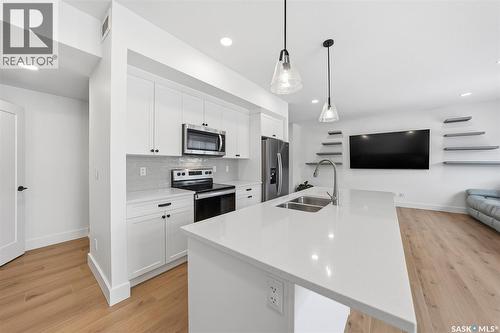 307 Keith Union, Saskatoon, SK - Indoor Photo Showing Kitchen With Double Sink With Upgraded Kitchen