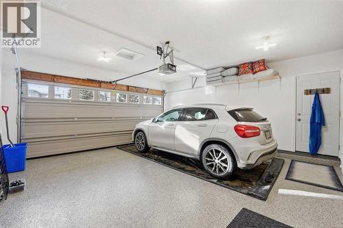 188 Millrise Drive Sw, Calgary, AB - Indoor Photo Showing Garage
