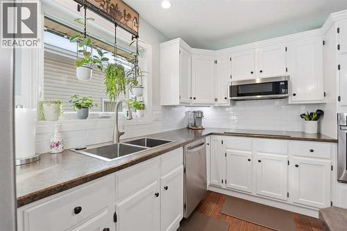 188 Millrise Drive Sw, Calgary, AB - Indoor Photo Showing Kitchen With Double Sink