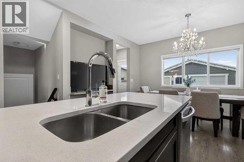 146 Marquis Common Se, Calgary, AB - Indoor Photo Showing Kitchen With Double Sink