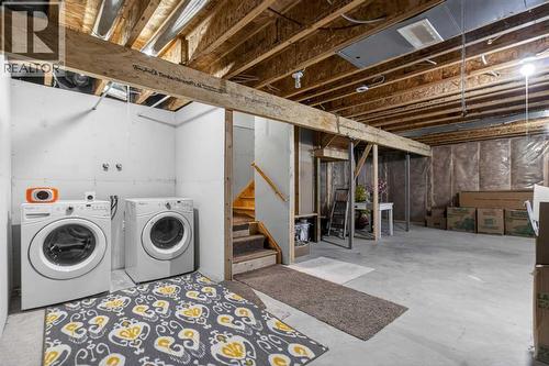 146 Marquis Common Se, Calgary, AB - Indoor Photo Showing Laundry Room