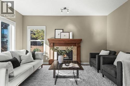 133 Sage Valley Close Nw, Calgary, AB - Indoor Photo Showing Living Room With Fireplace