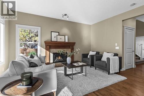 133 Sage Valley Close Nw, Calgary, AB - Indoor Photo Showing Living Room With Fireplace
