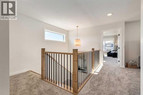 128 Quartz Crescent, Cochrane, AB - Indoor Photo Showing Other Room