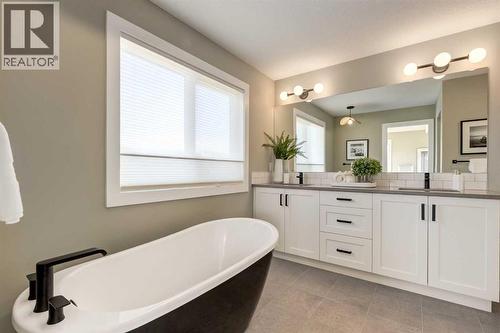 128 Quartz Crescent, Cochrane, AB - Indoor Photo Showing Bathroom