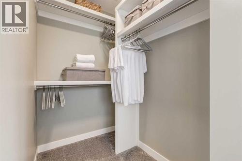 128 Quartz Crescent, Cochrane, AB - Indoor With Storage