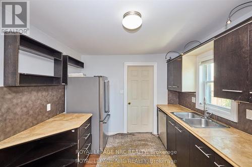 557 Geneva Street, St. Catharines (Lakeport), ON - Indoor Photo Showing Kitchen With Double Sink