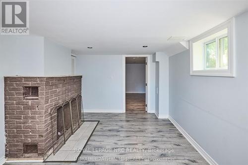 557 Geneva Street, St. Catharines (Lakeport), ON - Indoor Photo Showing Other Room With Fireplace