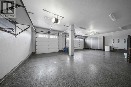Attached Triple Garage - 26 Van Horn Close, Red Deer, AB - Indoor Photo Showing Garage
