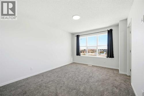 185 Edith Green Nw, Calgary, AB - Indoor Photo Showing Other Room