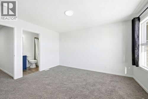 185 Edith Green Nw, Calgary, AB - Indoor Photo Showing Other Room