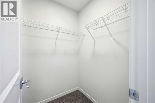 185 Edith Green Nw, Calgary, AB - Indoor With Storage