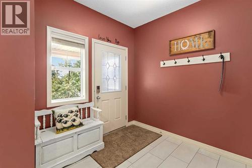 Front entry - 112 Sunset View, Cochrane, AB - Indoor Photo Showing Other Room