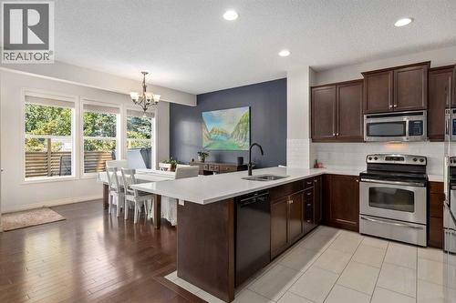 Kitchen/ Dining - 112 Sunset View, Cochrane, AB - Indoor Photo Showing Kitchen