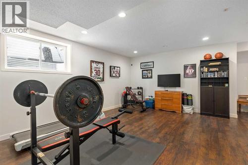 Basement rec. area - 112 Sunset View, Cochrane, AB - Indoor Photo Showing Other Room