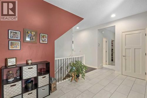 112 Sunset View, Cochrane, AB - Indoor Photo Showing Other Room