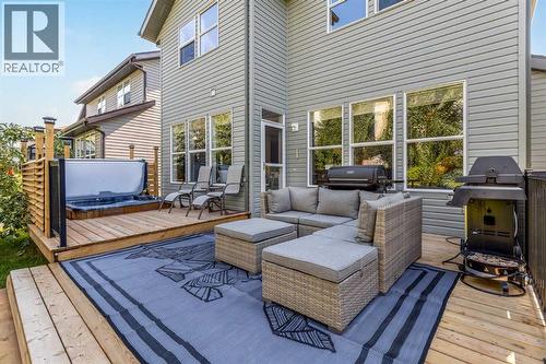 112 Sunset View, Cochrane, AB - Outdoor With Deck Patio Veranda With Exterior