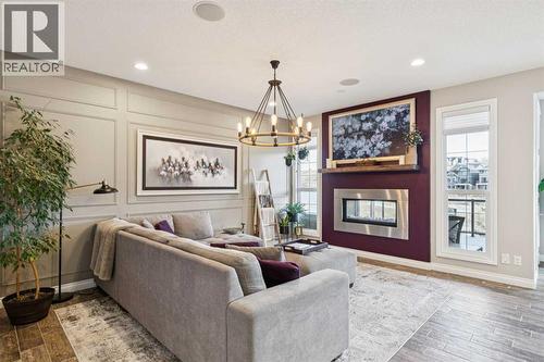 137 Sage Meadows Circle Nw, Calgary, AB - Indoor Photo Showing Living Room With Fireplace