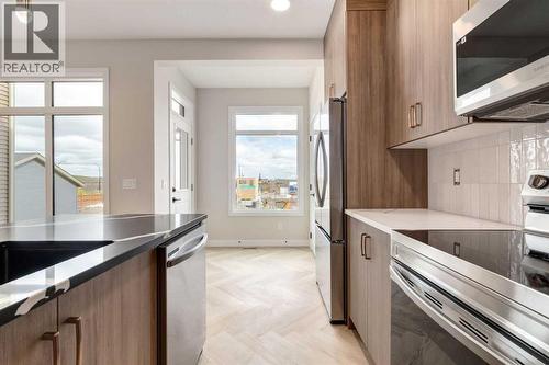 466 River Avenue, Cochrane, AB - Indoor Photo Showing Kitchen