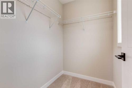 466 River Avenue, Cochrane, AB - Indoor With Storage