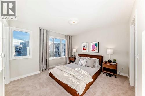 94 Agate Road, Cochrane, AB - Indoor Photo Showing Bedroom