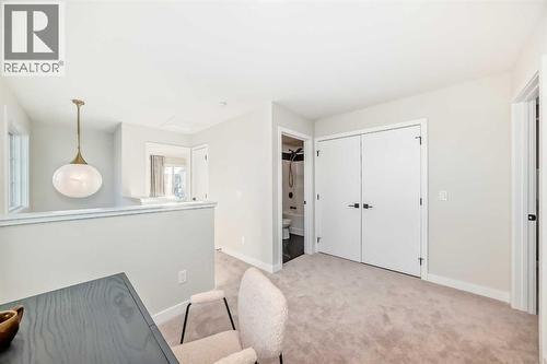 94 Agate Road, Cochrane, AB - Indoor Photo Showing Other Room