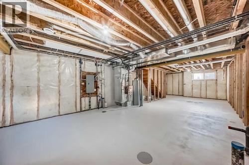 94 Agate Road, Cochrane, AB - Indoor Photo Showing Basement