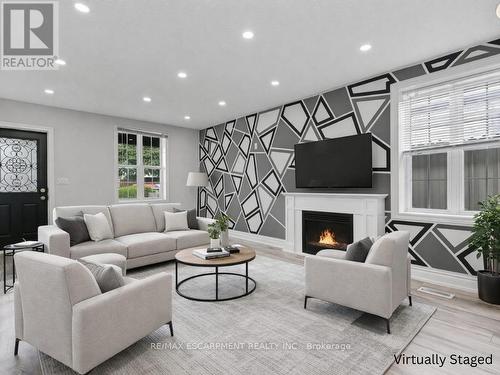 54 Craigmiller Avenue, Hamilton, ON - Indoor Photo Showing Living Room With Fireplace