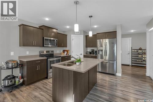 131 315 Dickson Crescent, Saskatoon, SK - Indoor Photo Showing Kitchen With Double Sink With Upgraded Kitchen