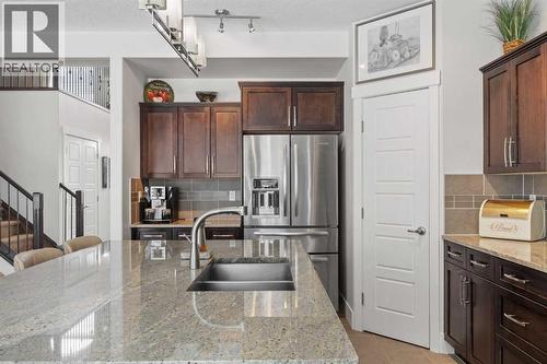184 Magenta Crescent, Chestermere, AB - Indoor Photo Showing Kitchen With Double Sink With Upgraded Kitchen