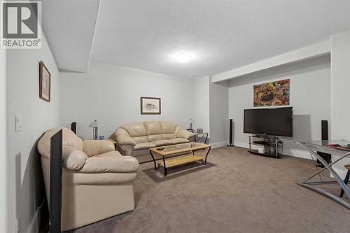 Movie area! - 184 Magenta Crescent, Chestermere, AB - Indoor Photo Showing Other Room