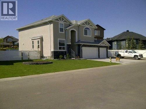 Summertime pic! - 184 Magenta Crescent, Chestermere, AB - Outdoor With Facade