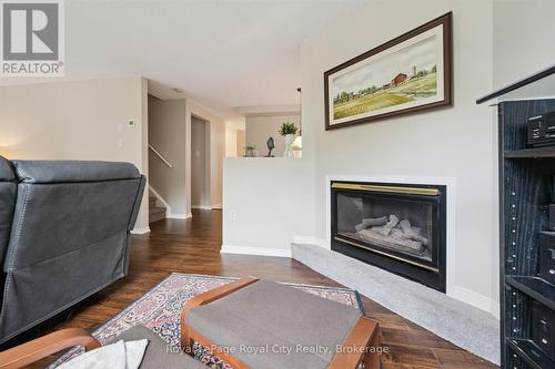487 Flannery Drive, Centre Wellington (Fergus), ON - Indoor Photo Showing Living Room With Fireplace