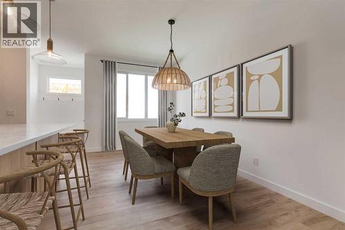 Virtually Staged - 98 Agate Road, Cochrane, AB - Indoor Photo Showing Dining Room