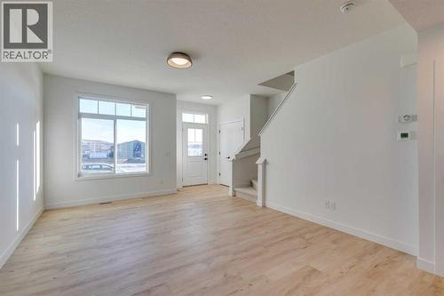 98 Agate Road, Cochrane, AB - Indoor Photo Showing Other Room