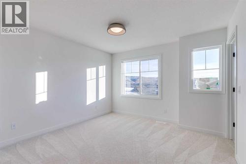 98 Agate Road, Cochrane, AB - Indoor Photo Showing Other Room