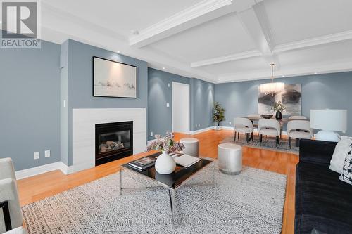 509 - 65 Port Street E, Mississauga, ON - Indoor Photo Showing Living Room With Fireplace