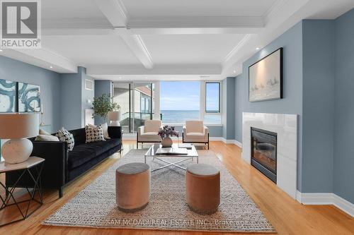 509 - 65 Port Street E, Mississauga, ON - Indoor Photo Showing Living Room With Fireplace