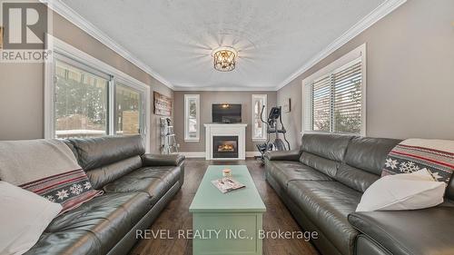 6 Decou Road, Norfolk, ON - Indoor Photo Showing Living Room With Fireplace
